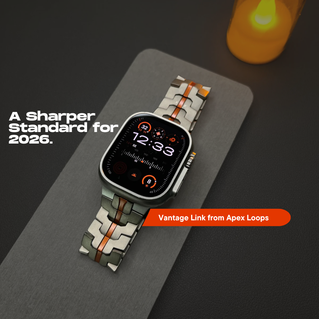 Luxury Apple Watch metal link band with orange accents and silver finish