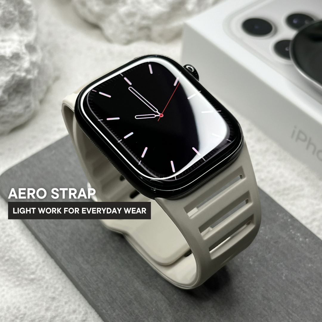 Apple Watch with light gray rugged sport band on minimalist desk setup